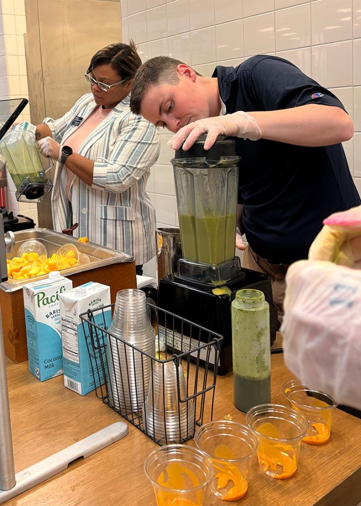UNCG dining staff making smoothies.