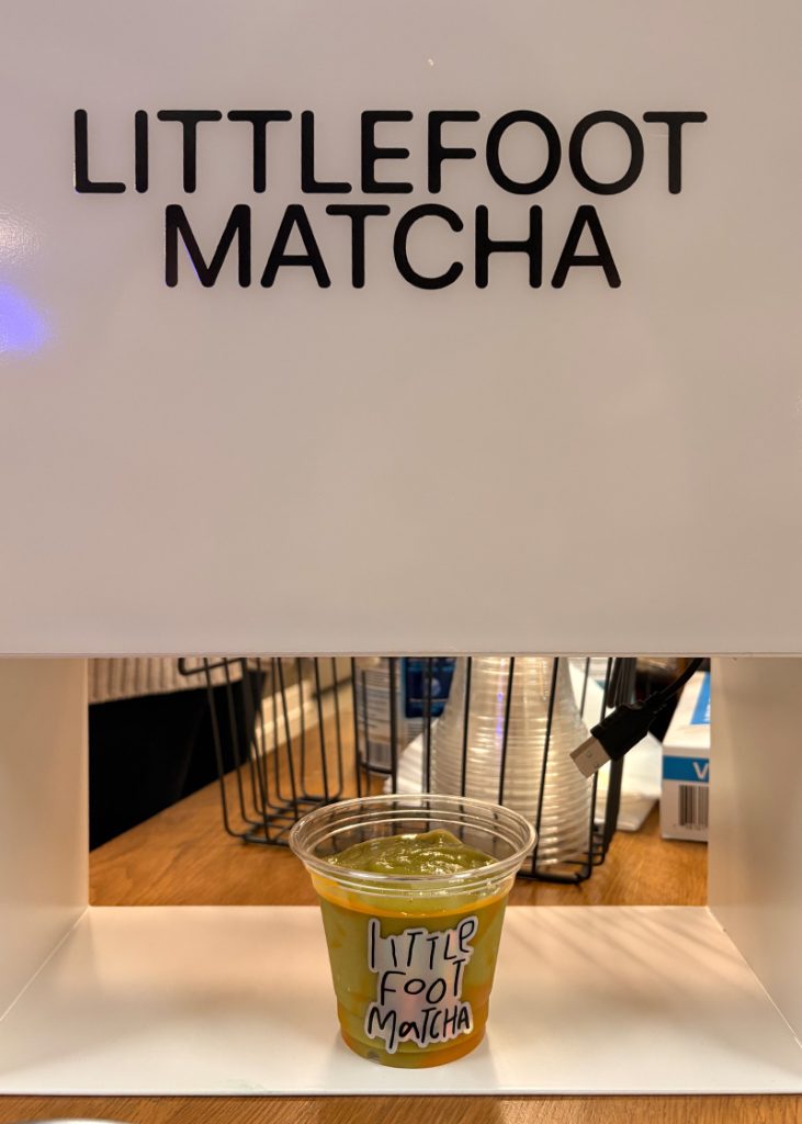 A smoothie cup with the Littlefoot Matcha label.