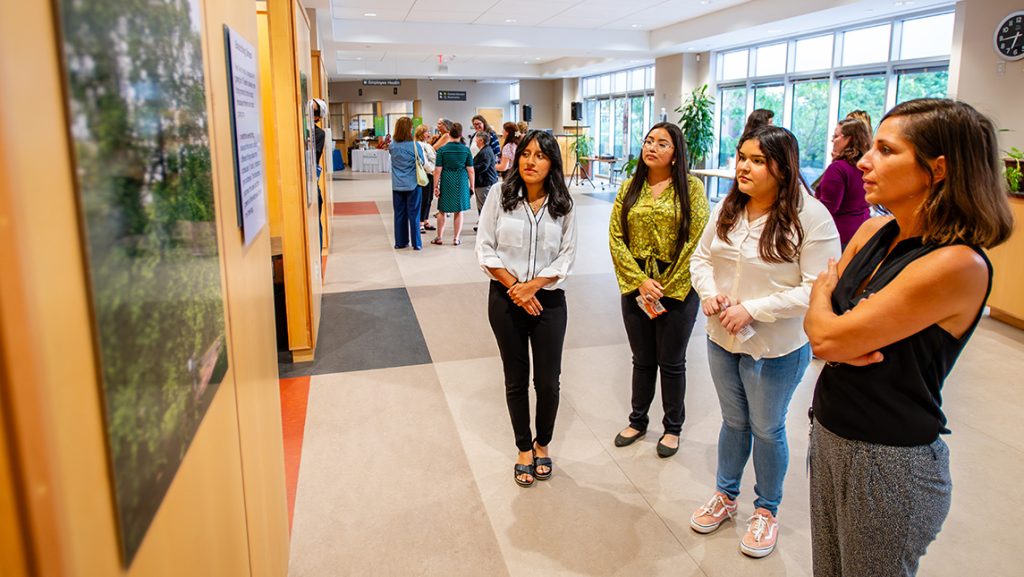 Teens use photography to express mental wellness topics at the "Healthy Transitions" exhibit.
