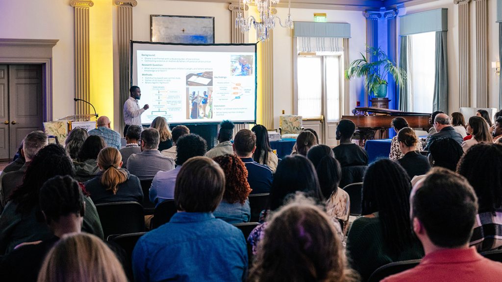 UNCG nanoscience student Samuel Adegoke gives a presentation.