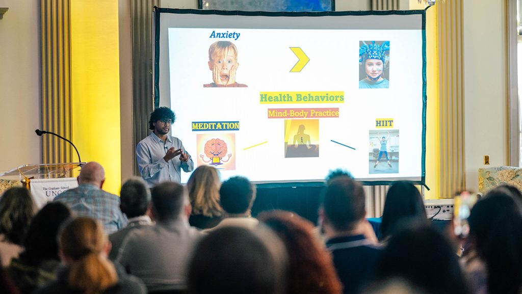 UNCG student Praveen Pasupathi gives a presentation.