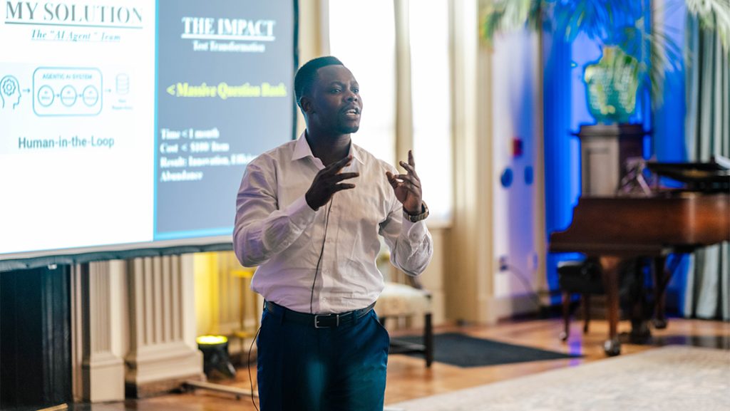 UNCG nanoscience student Samuel Adegoke gives a presentation.