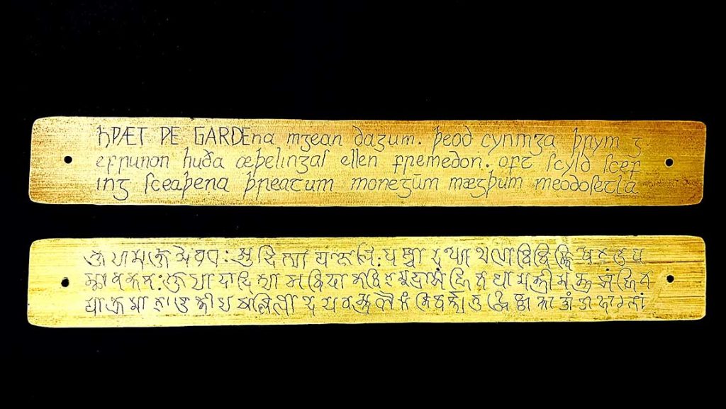 two palm struts with writing on them