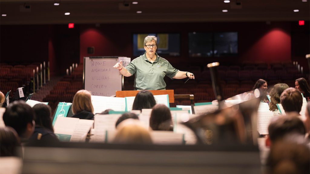 Students in an orchestra.