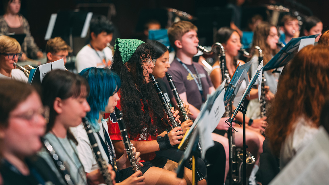Students practice in an orchestra.