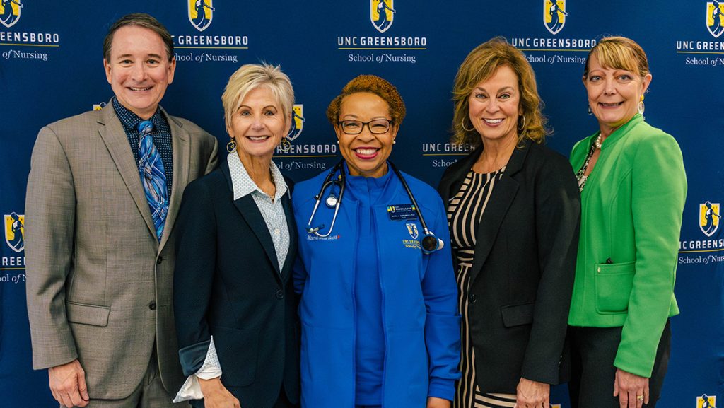 UNCG Nursing leadership and trustees' group photo.