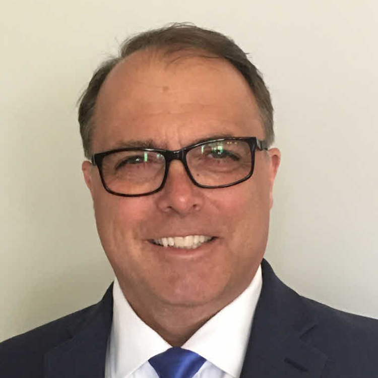 Headshot off John Loonan, Vice Chancellor of Finance and Administration.