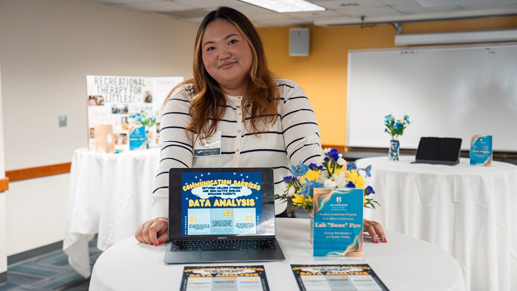 a girl presents from a computer