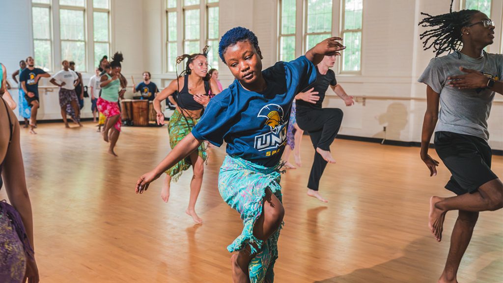 Carina Young dances in the studio.