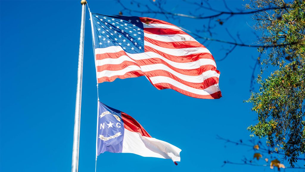 American flag and North Carolina flag.