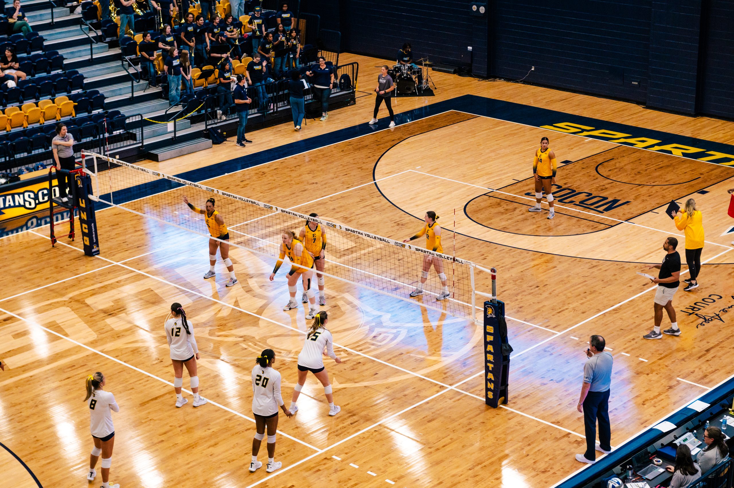 volleyball court with players on it