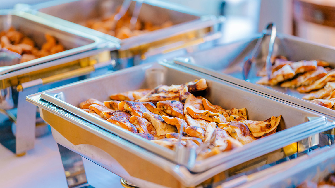 Trays of breakfast food.