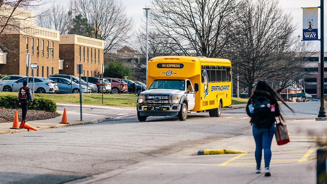 Bus driving on the street.