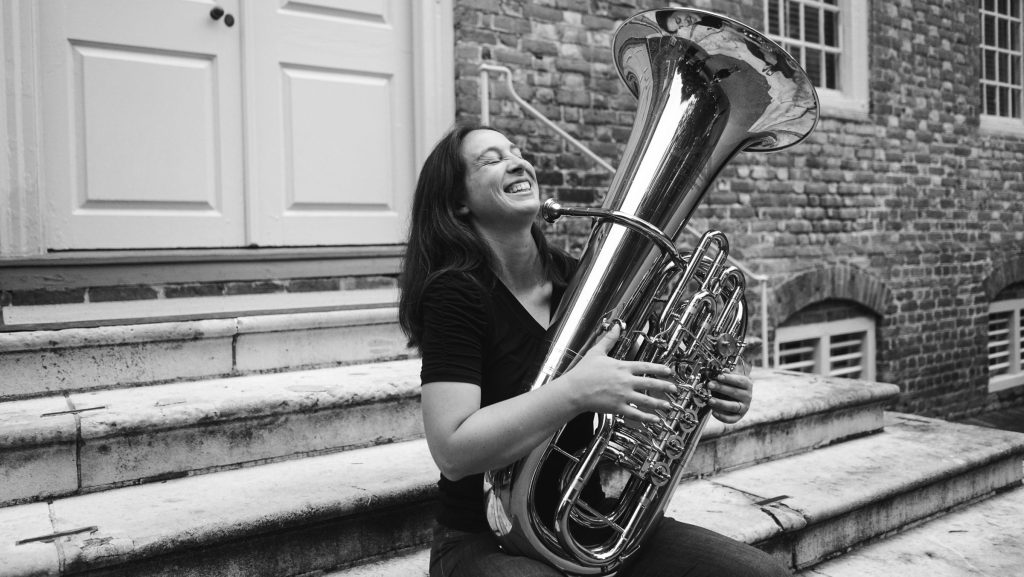 Stephanie ycaza with the tuba in black and white