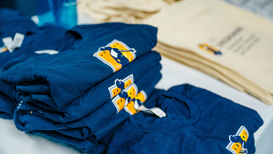 Stacks of t-shirts.