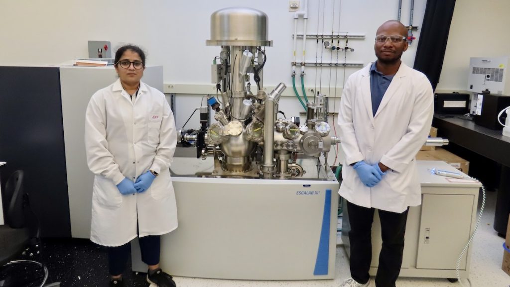 JSNN JSIRT's Dr. Shobha poses with an assistant in lab.