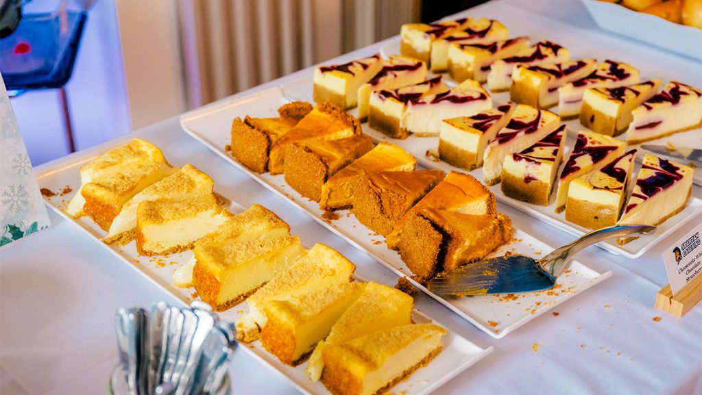 Platters of cheesecake slices.